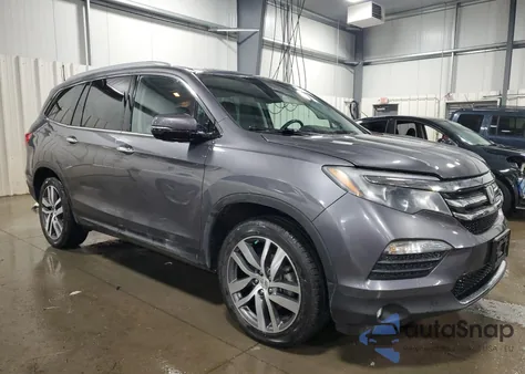 2016 Honda Pilot Elite z USA, uszkodzony, nr VIN 5FNYF6H01GB030337